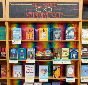image shows the display of neurodivergence related books at Powell's books in Portland Oregon